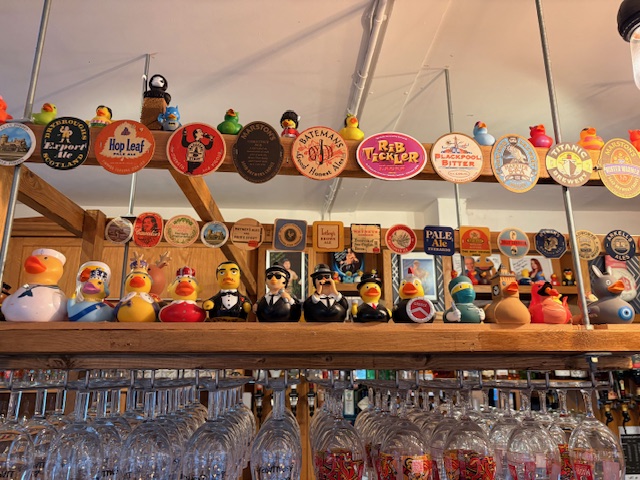 A collection of ducks which customers have been donating to eventually race on the Wandle for a charity day